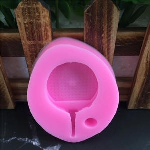 Pink silicone mold for table tennis paddle and ball cake decorating and DIY crafts