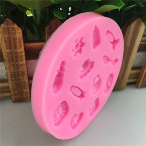 Pink round silicone mold featuring heart, milk bottle and floral shapes for DIY cake baking
