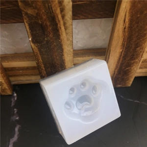 Translucent silicone paw mold for chocolate or fondant with a thick square base