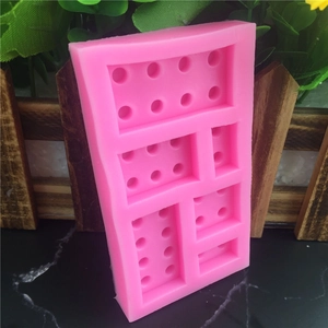 Pink building block silicone cake mold for DIY chocolate and Lego-style baking