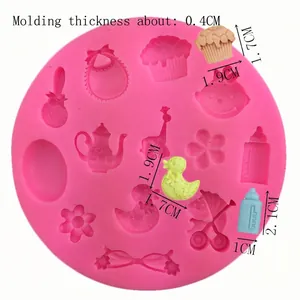 Pink silicone baby fondant mold featuring 11 shapes like stroller and bottle for DIY baking