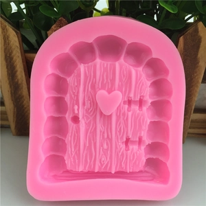 Pink fairy door silicone mold with wood texture and heart detail for fondant and DIY crafts