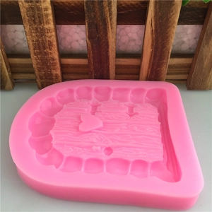Pink fairy door silicone mold with wood texture and heart patterns for fondant cake