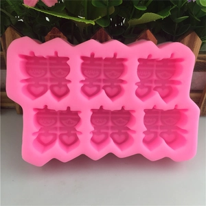 Pink 6-cavity silicone mold featuring traditional Double Happiness Xi character for cakes
