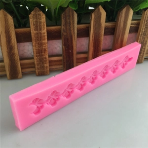 Pink silicone clover lace border mold for fondant cake decorating and DIY baking craft