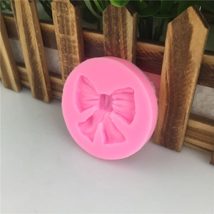 Moule rond en silicone rose avec motif nœud pour gâteaux fondant et artisanat DIY