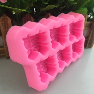 Pink silicone mold with 6 cavities featuring Chinese Double Happiness 3D relief design