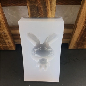 Translucent silicone mold featuring heart-shaped cartoon rabbit design for DIY crafts