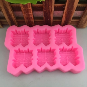 Pink silicone 6-cavity mold featuring traditional Chinese Xi character for cake and soap