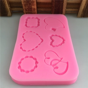 Pink silicone mold with 6 heart and square shapes for DIY cake fondant or resin crafts
