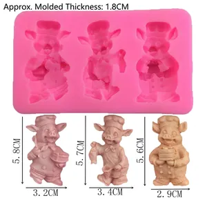Stampo in silicone rosa per fondente con tre motivi a maialino chef per decorazione torte