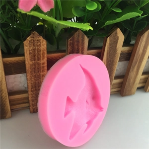 Pink silicone mold featuring a detailed tropical fish shape for fondant and DIY baking