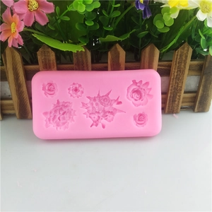 Pink silicone flower molds with six floral patterns for soap and cake making