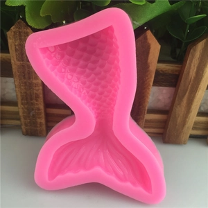 Pink silicone mermaid tail mold for fondant cakes and DIY crafts with fish scale texture