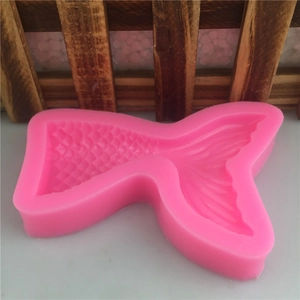 Large pink silicone mermaid tail mold with detailed scales for fondant cake decoration