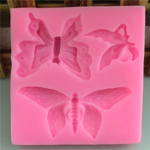 Pink silicone butterfly mold with three cavities for fondant and cake decoration