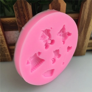 Moule à fondant en silicone rose avec motifs de robes et couronnes pour gâteaux