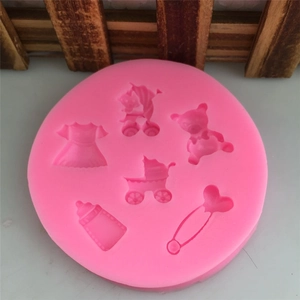 Moule en silicone rose avec motifs bébé comme ours et poussette pour pâtisserie et gâteaux