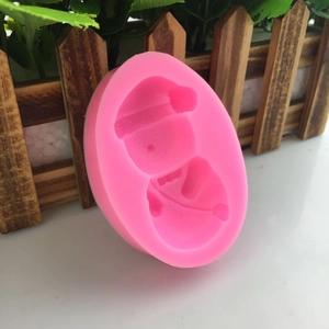 Pink silicone snowman mold for handmade fondant cake decorating and DIY crafts