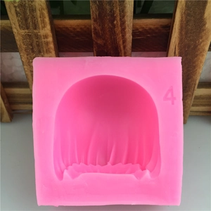 Square pink silicone fondant mold with wavy texture and number 4 for cake decorating
