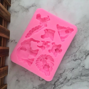 Moule en silicone rose avec diverses formes d'animaux africains pour fondant et pâtisserie