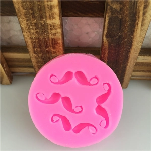 Pink silicone mustache mold for cake decorating and handmade DIY crafts, circular shape