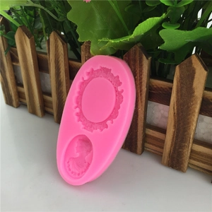 Pink silicone mold for DIY fondant and soap featuring oval frames and relief portraits