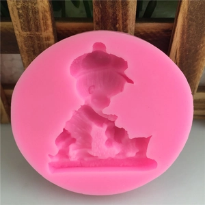 Pink round silicone mold featuring a cute cartoon girl for DIY fondant and cake baking