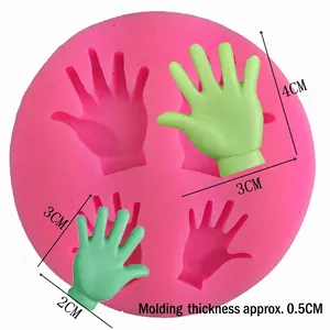 Pink silicone fondant mold featuring four different sizes of hand shapes for DIY baking