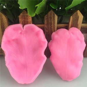Pink silicone leaf mold set for fondant cake decorating with realistic petal textures