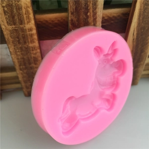Pink silicone fondant mold featuring a detailed 3D cartoon donkey shape for cake baking