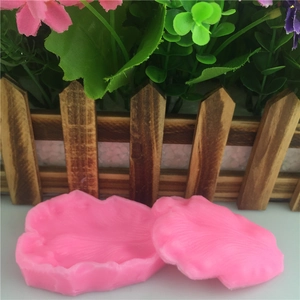 Pink silicone leaf mold for fondant cake decorating with realistic vein textures