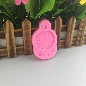 Pink 3D clock shaped silicone mold with Roman numerals for cake baking and crafts