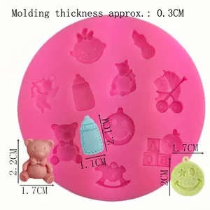 Pink silicone baby themed fondant mold with 11 shapes like bottle bear and carriage