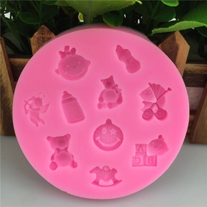 Pink silicone baby themed mold for fondant cake decorating and DIY baking projects