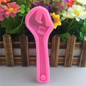 Pink silicone wrench shape mold for DIY fondant cake decoration and soap crafting