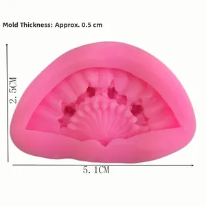 Macro detail of pink silicone fan mold showing 5.1cm length and 2.5cm width dimensions