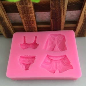 Pink silicone fondant mold featuring bikini and jacket shapes for cake decorating