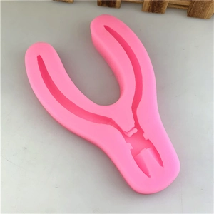 Pink silicone mold with DIY pliers shapes for fondant cake decorating and resin crafts
