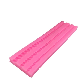 Pink silicone fondant mold with three sizes of pearl beads for cake border decoration