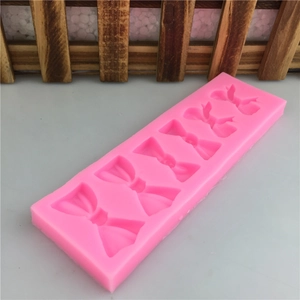 Moule en silicone rose à 5 cavités avec nœuds pour décoration de gâteaux et fondant