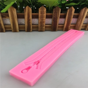 Pink silicone zipper mold for fondant and chocolate DIY baking with detailed texture