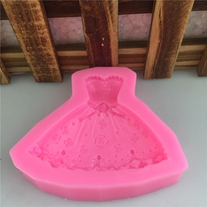 Macro detail of pink silicone mold featuring an elegant wedding dress with rose textures