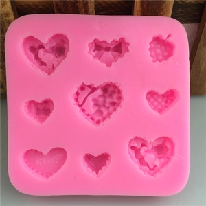 Pink silicone heart mold with 9 compartments for DIY fondant and cake decorating