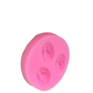 Pink silicone mold with three small bird patterns for 3D cake fondant and DIY crafts