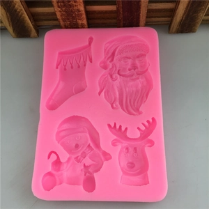 Moule de Noël en silicone rose avec Père Noël et élan pour fondant et chocolat maison