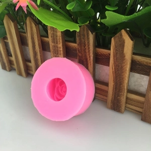 Pink silicone rose flower mold for DIY resin crafts and fondant cake decorating