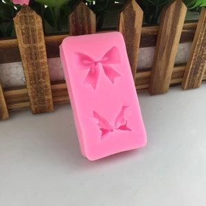 Moule en silicone rose avec nœuds pour décoration de gâteaux et savons artisanaux