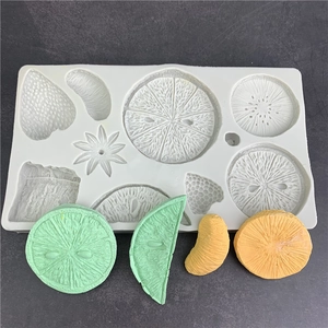 White silicone fruit mold for fondant and chocolate cake decoration with fruit shapes