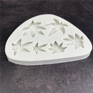 Silicone mold with five maple leaf patterns for cake decoration and chocolate making